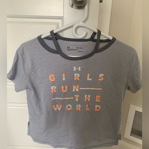 Grey under armour loose fit shirt with orange words.